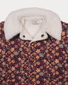 Early Sunday, Esmée Jacket in Garden Flowers Plum, made from Printed Cotton Satin fabric, featuring a quilted layer with delicate floral print and elegant detailing, shown in a closeup flat-lay view