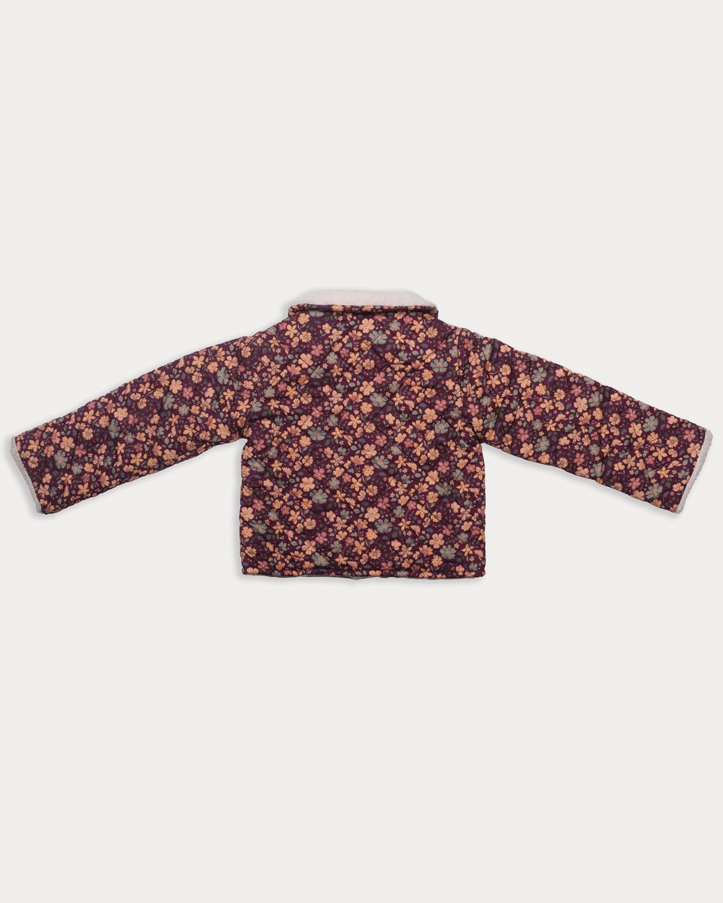 Early Sunday, Esmée Jacket in Garden Flowers Plum, made from Printed Cotton Satin fabric, featuring a quilted layer with delicate floral print and elegant detailing, shown in a back flat-lay view