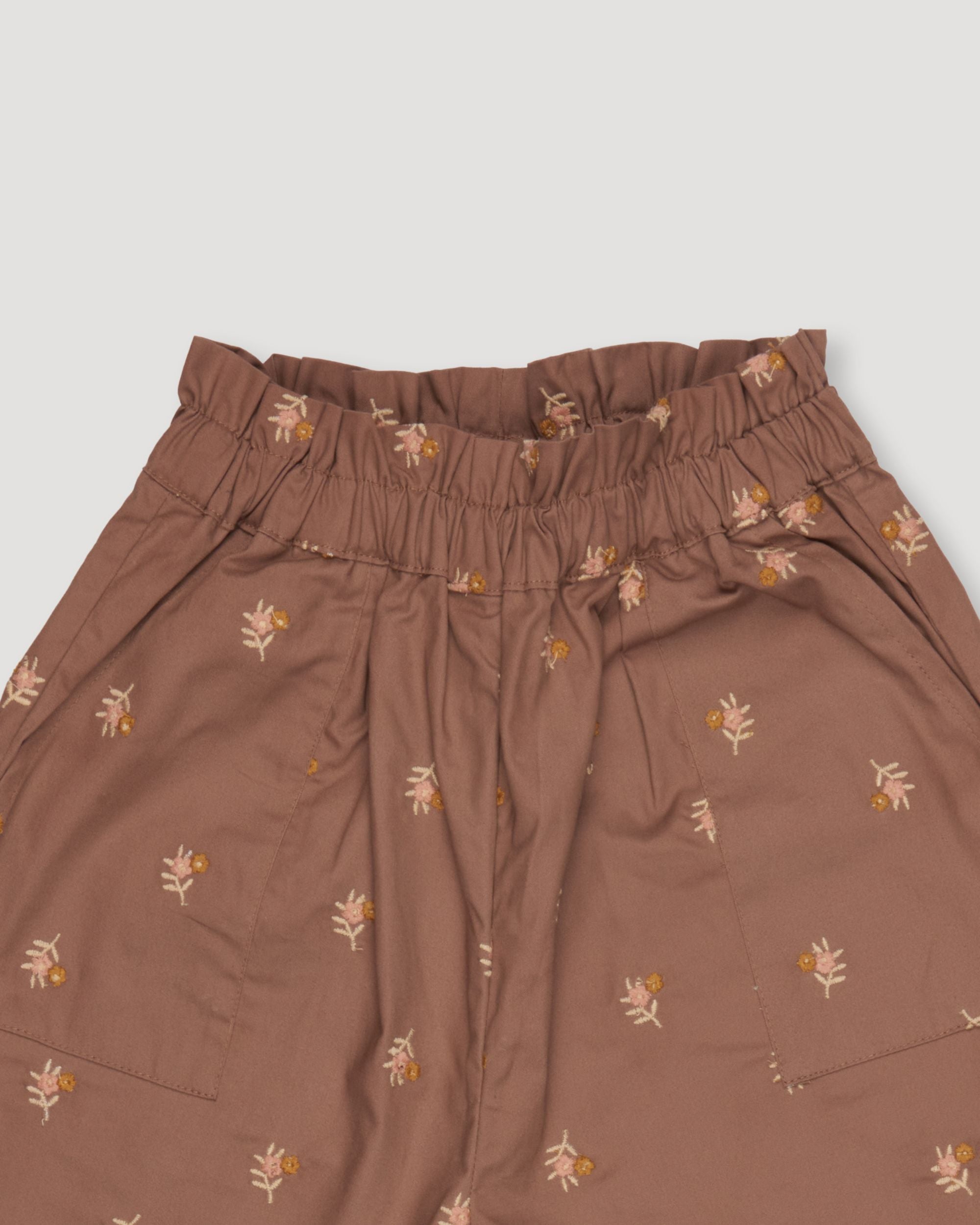 Early Sunday, Adrien Trouser in Bark, made from All-Over Embroidered 30s Cotton Brushed Twill fabric, featuring Relaxed design with ample room for movement, perfect for active kids, shown in a closeup flat-lay view