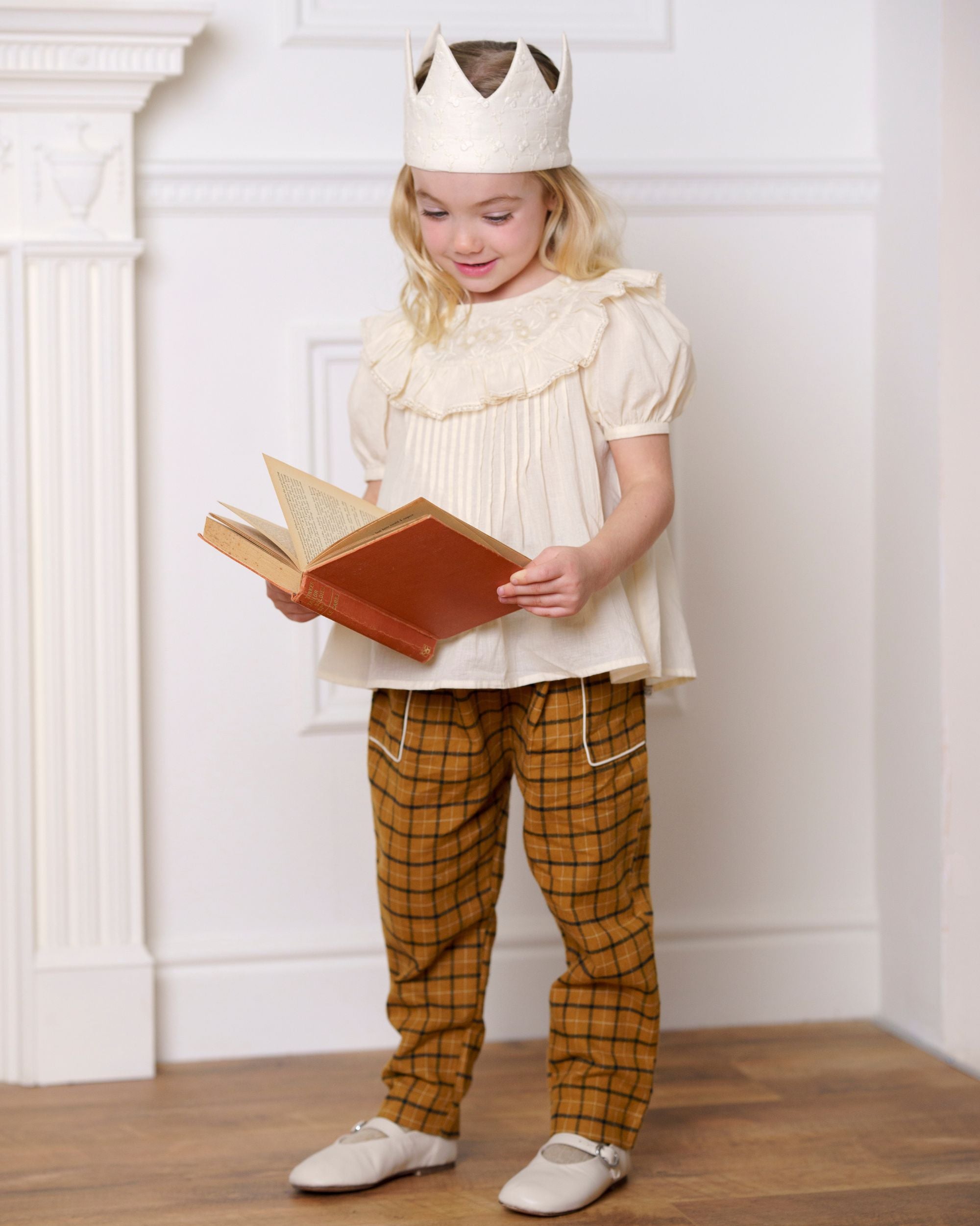 Early Sunday, Adrien Trouser in Almond Checks, made from Cotton Yarn Dyed Brushed Checks fabric, featuring Relaxed design with ample room for movement, perfect for active kids, shown in a front view of model wearing it