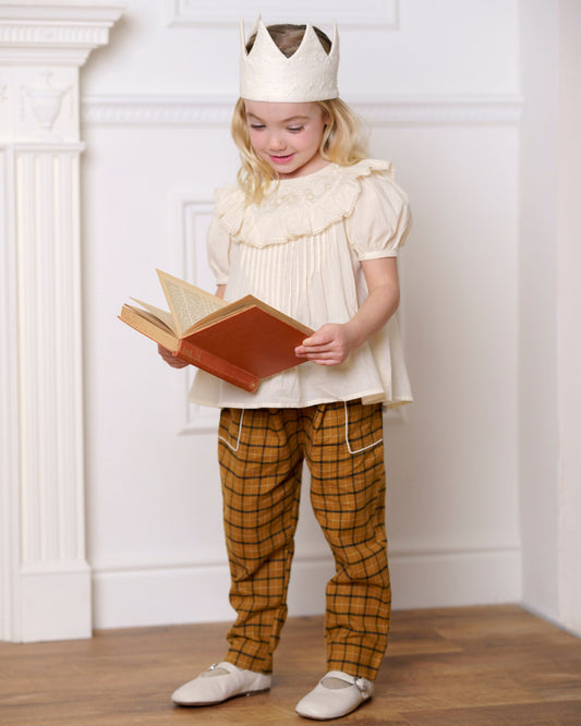 Early Sunday, Adrien Trouser in Almond Checks, made from Cotton Yarn Dyed Brushed Checks fabric, featuring Relaxed design with ample room for movement, perfect for active kids, shown in a front view of model wearing it