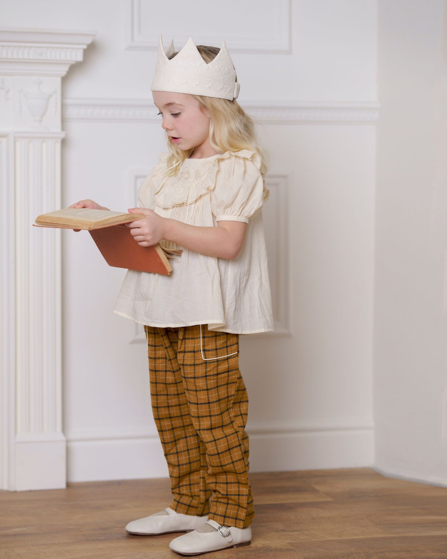 Early Sunday, Adrien Trouser in Almond Checks, made from Cotton Yarn Dyed Brushed Checks fabric, featuring Relaxed design with ample room for movement, perfect for active kids, shown in a front view of model wearing it