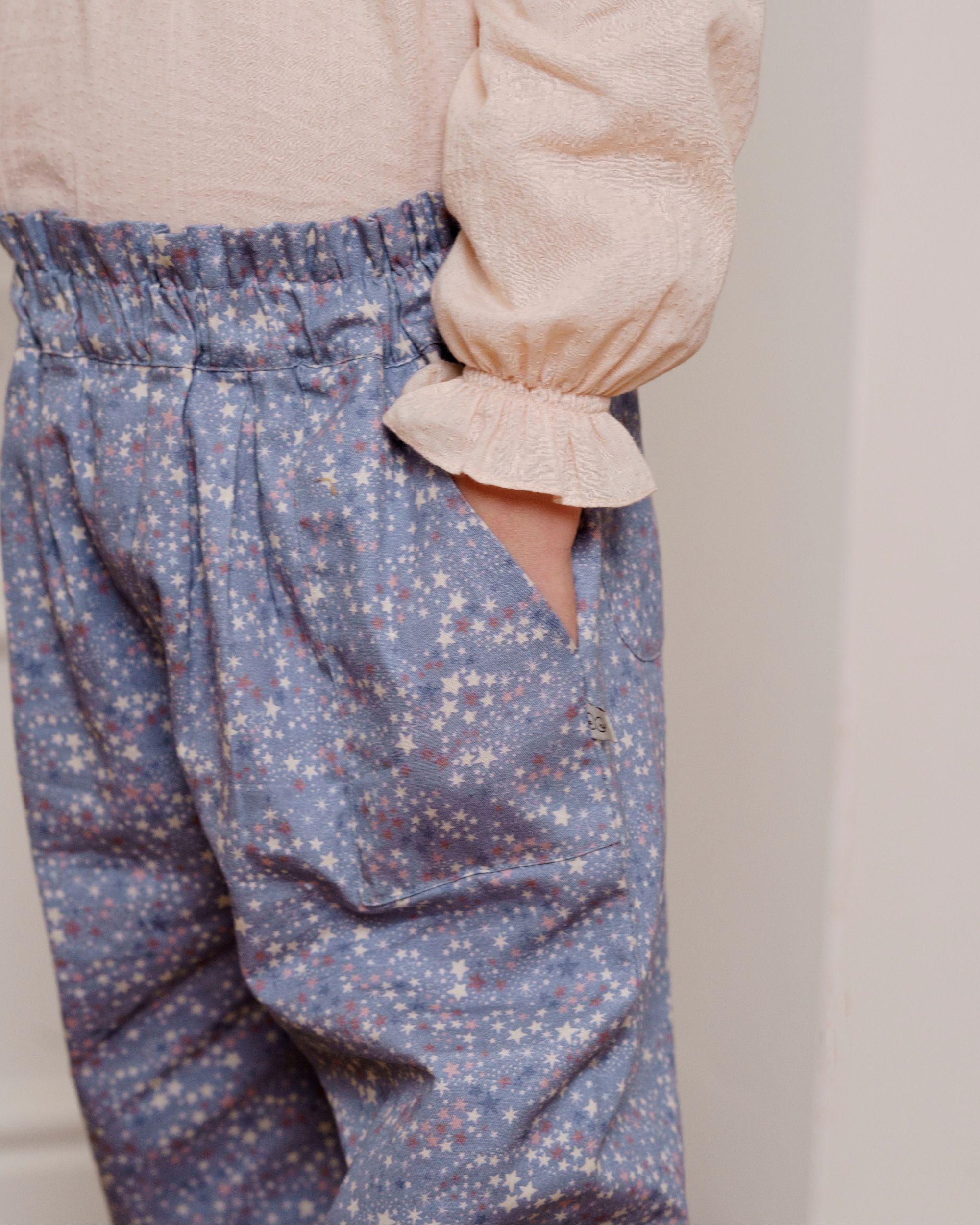 Early Sunday, Adrien Trouser in Celestial print, made from Printed 30s Cotton Twill fabric, featuring Relaxed design with ample room for movement, perfect for active kids, shown in a close-up of print