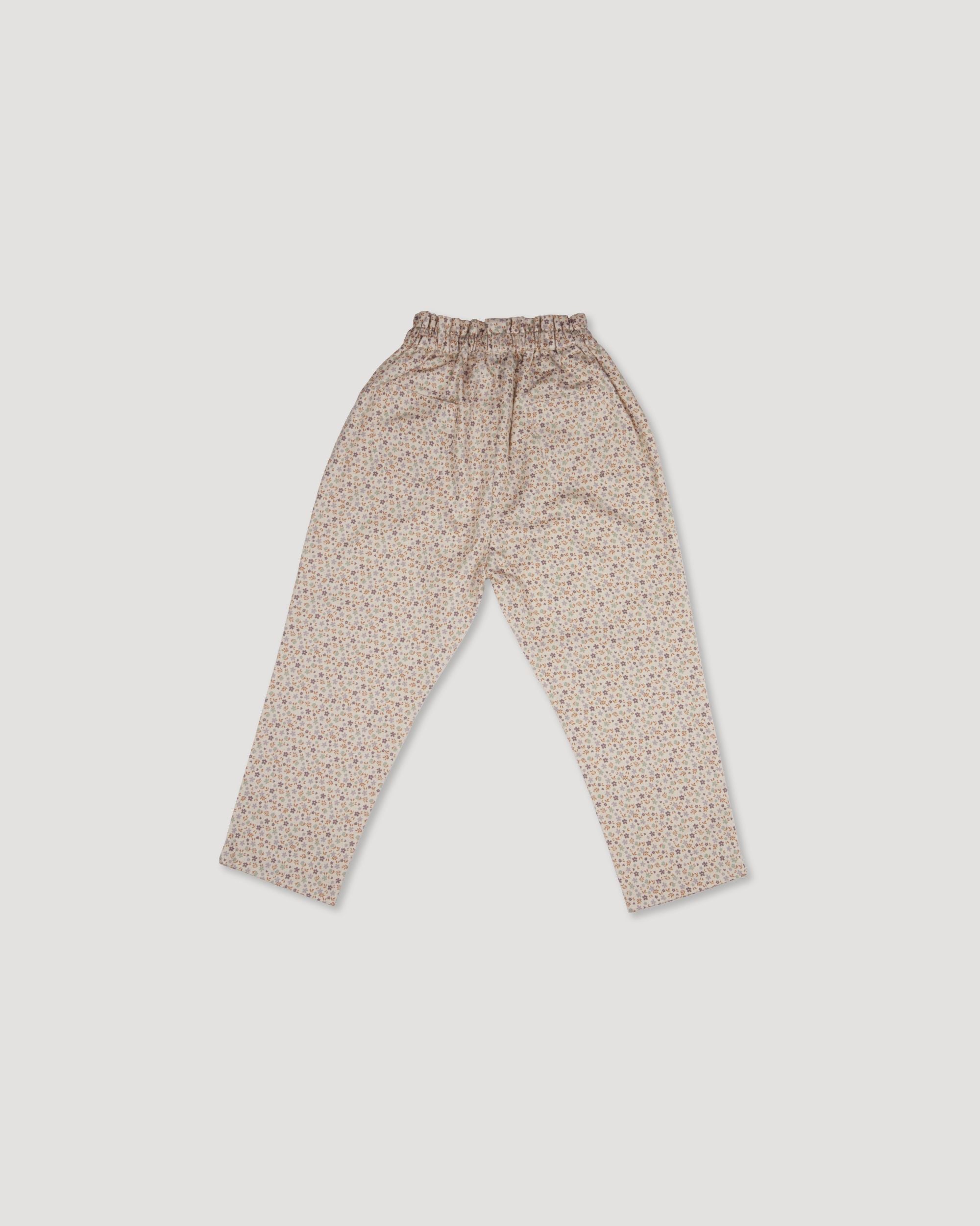 Early Sunday, Adrien Trouser in Floral print, made from Printed 30s Cotton Twill fabric, featuring Relaxed design with ample room for movement, perfect for active kids, shown in a back flat-lay view