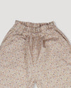 Early Sunday, Adrien Trouser in Floral print, made from Printed 30s Cotton Twill fabric, featuring Relaxed design with ample room for movement, perfect for active kids, shown in a closeup flat-lay view