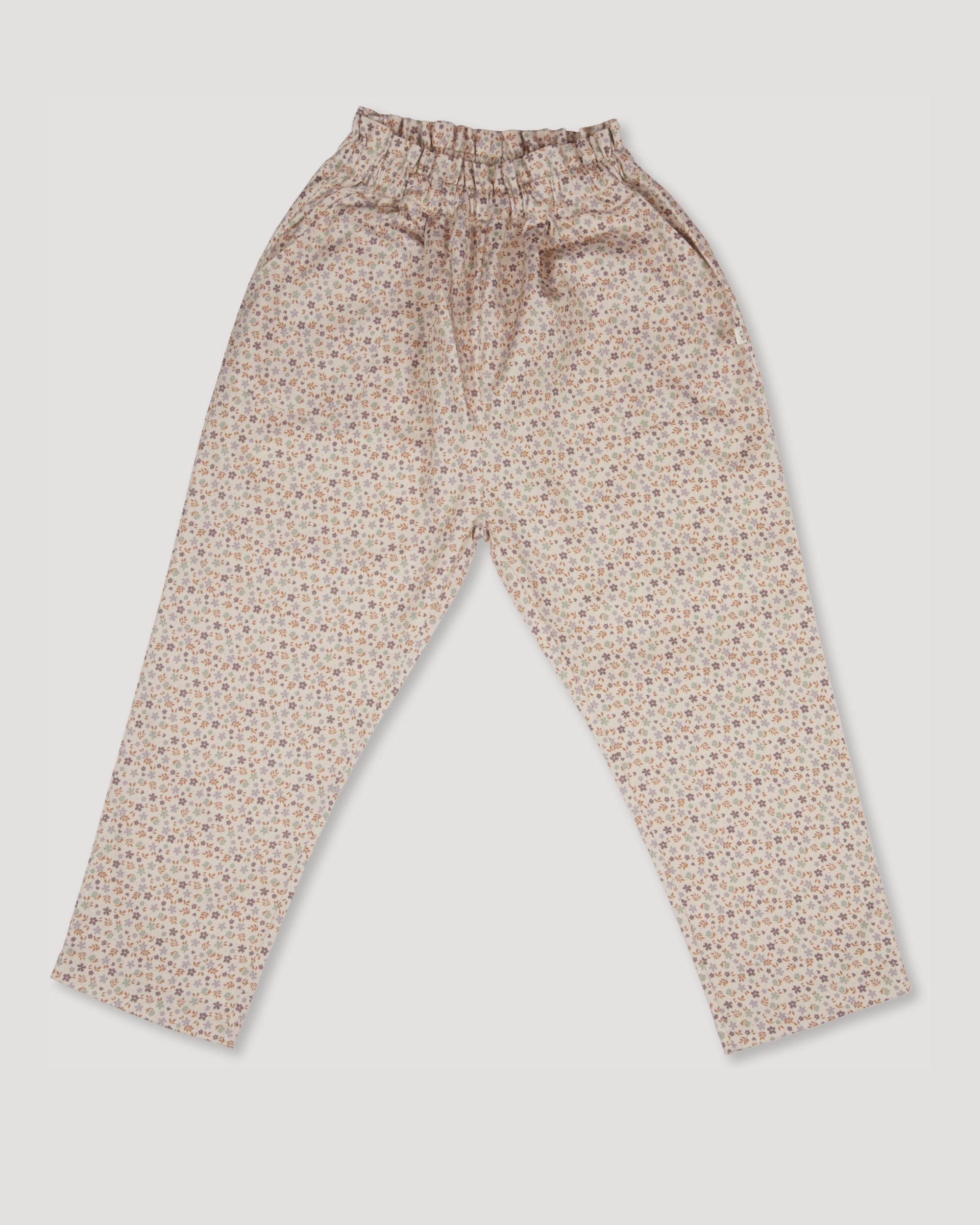 Early Sunday, Adrien Trouser in Miny Flowers print, made from Printed 30s Cotton Twill fabric, featuring Relaxed design with ample room for movement, perfect for active kids, shown in a back flat-lay view