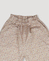 Early Sunday, Adrien Trouser in Miny Flowers print, made from Printed 30s Cotton Twill fabric, featuring Relaxed design with ample room for movement, perfect for active kids, shown in a closeup flat-lay view