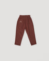 Early Sunday, Adrin Trouser in Caramel, made from Cotton Corduroy fabric, featuring a relaxed silhouette with a comfortable elastic waistband, shown in a back flat-lay view