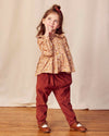 Early Sunday, Adrin Trouser in Caramel, made from Cotton Corduroy fabric, featuring a relaxed silhouette with a comfortable elastic waistband, shown in a front view of model wearing it