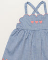 Early Sunday, Alice Baby Dress & Bloomer Set in Summer Sky color, made from 100% Cotton Chambray fabric, featuring a sleeveless design with a smocked bodice & matching bloomers, shown in a closeup flat-lay view