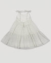 Early Sunday, Alice Dress in Mini Flower print, made from Printed canvas 70% Cotton 30% Linen fabric, featuring sleeveless with adjustable tie-up straps and a tiered silhouette, shown in a back flat-lay view
