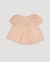 Early Sunday, Amelia Blouse in Nude, made from Dyed Cotton Swiss Dobby Tiny Dots fabric, featuring Classic pleats that enhance the fit and finish, shown in a front flat-lay view