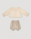 Early Sunday, Amy Baby Blouse & Bloomer Set in Hazelnut Cream & Mini Floral print, made from Dyed Cotton Swiss Dobby Tiny Dots fabric, featuring a full sleeves with beautiful embroidery & printed floral bloomers, shown in a back flat-lay view