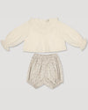 Early Sunday, Amy Baby Blouse & Bloomer Set in Hazelnut Cream & Mini Floral print, made from Dyed Cotton Swiss Dobby Tiny Dots fabric, featuring a full sleeves with beautiful embroidery & printed floral bloomers, shown in a front flat-lay view