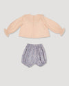 Early Sunday, Amy Baby Blouse & Bloomer Set in Nude & Celestial print, made from Dyed Cotton Swiss Dobby Tiny Dots fabric, featuring a delicate embroidery & lace-trimmed ruffles with elasticated bloomers, shown in a back flat-lay view