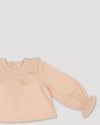 Early Sunday, Amy Baby Blouse & Bloomer Set in Nude & Celestial print, made from Dyed Cotton Swiss Dobby Tiny Dots fabric, featuring a delicate embroidery & lace-trimmed ruffles with elasticated bloomers, shown in a closeup flat-lay view