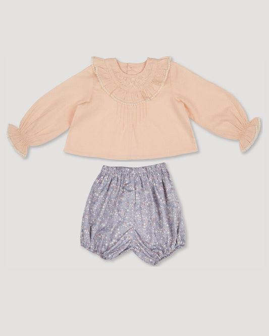 Early Sunday, Amy Baby Blouse & Bloomer Set in Nude & Celestial print, made from Dyed Cotton Swiss Dobby Tiny Dots fabric, featuring a delicate embroidery & lace-trimmed ruffles with elasticated bloomers, shown in a front flat-lay view