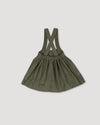 Early Sunday, Annie Skirt in Moss, made from Cotton Corduroy fabric, featuring a relaxed fit with an elastic waistband & beautiful embroidery, shown in a back flat-lay view