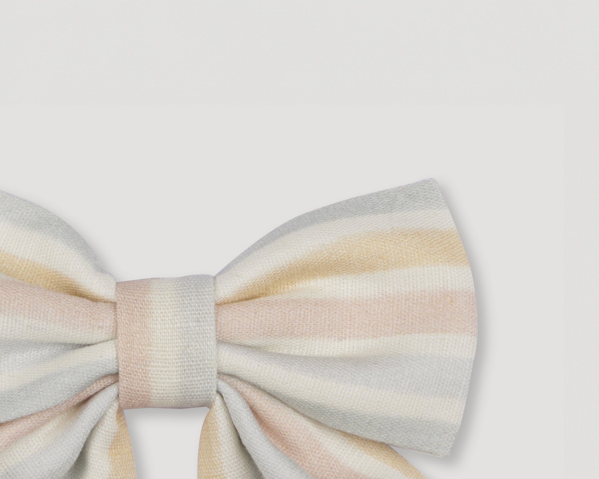 Early Sunday, Audrey Alligator Clip in Summer Stripe, made from Printed canvas 70% Cotton 30% Linen fabric, featuring a fabric bow design with a secure hair clip fastening, shown in a closeup flat-lay view