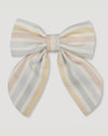 Early Sunday, Audrey Alligator Clip in Summer Stripe, made from Printed canvas 70% Cotton 30% Linen fabric, featuring a fabric bow design with a secure hair clip fastening, shown in a front flat-lay view