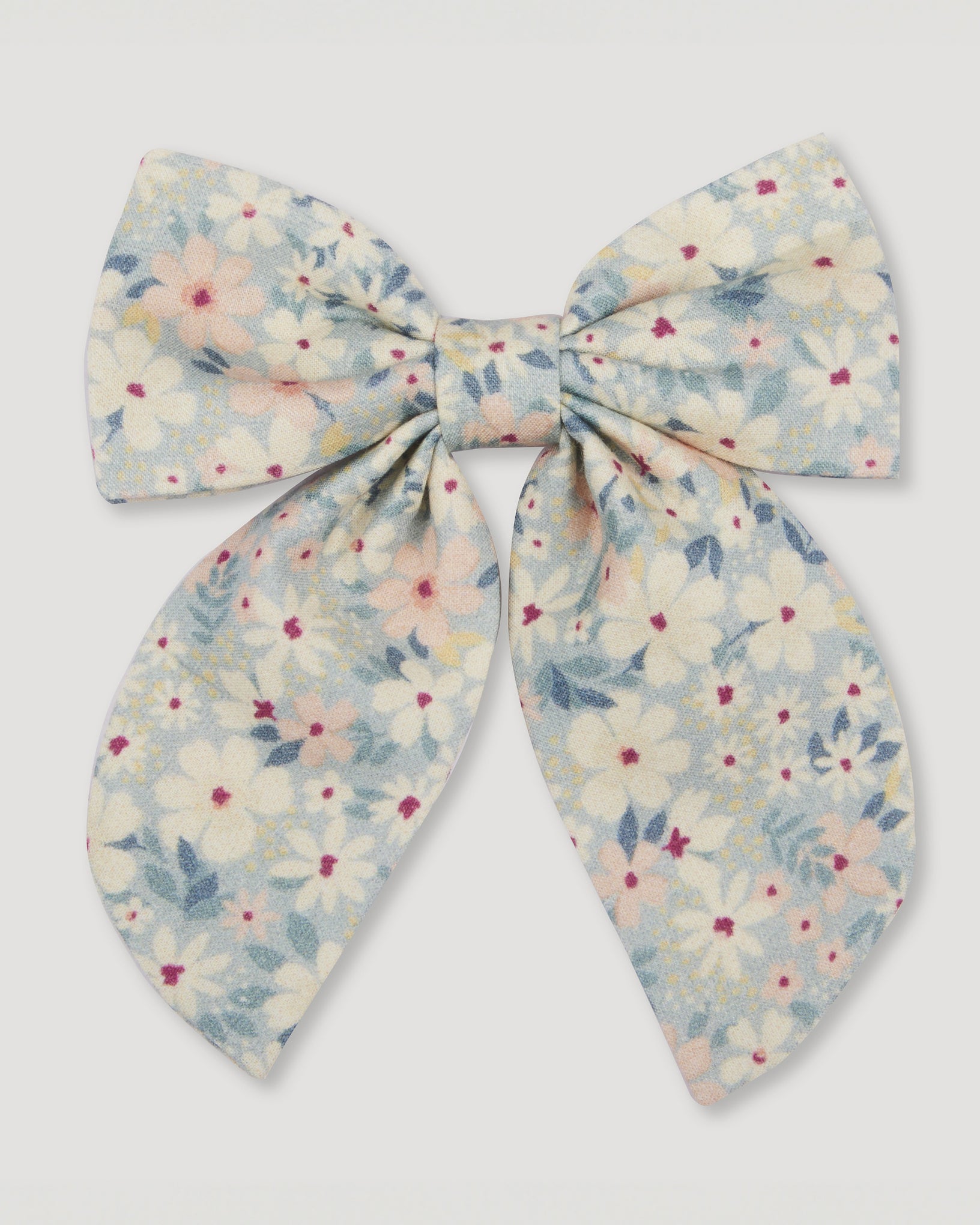 Early Sunday, Audrey Alligator Clip in Amelia print, made from Printed Cotton Cambric fabric, featuring a fabric bow design with a secure hair clip fastening, shown in a front flat-lay view