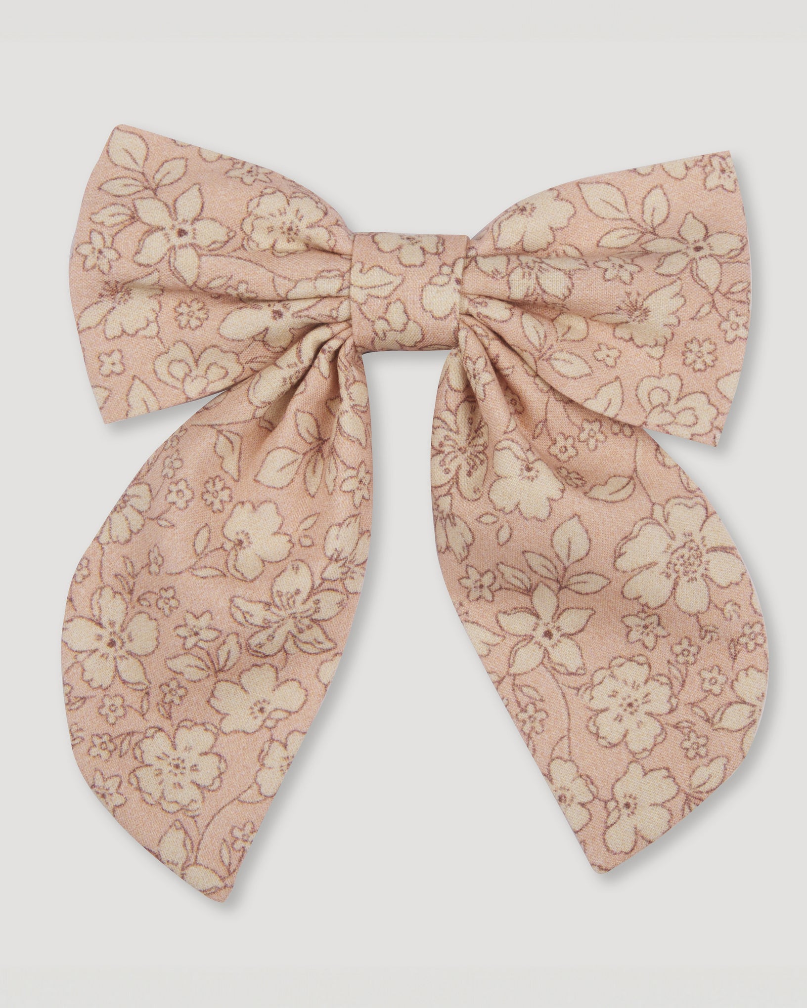 Early Sunday, Audrey Alligator Clip in Garden Flowers print, made from Printed Cotton Cambric fabric, featuring a fabric bow design with a secure hair clip fastening, shown in a front flat-lay view