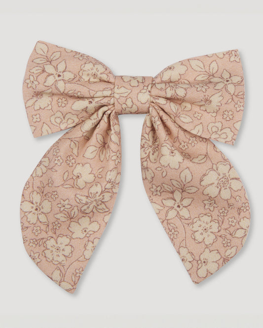 Early Sunday, Audrey Alligator Clip in Garden Flowers print, made from Printed Cotton Cambric fabric, featuring a fabric bow design with a secure hair clip fastening, shown in a front flat-lay view