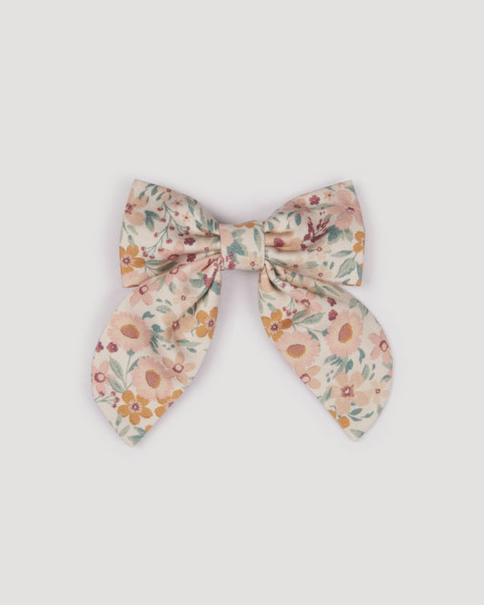 Early Sunday, Audrey Clip in Floral print, made from Printed 60s Cotton Satin fabric, featuring a fabric bow design with a secure hair clip fastening, shown in a front flat-lay view