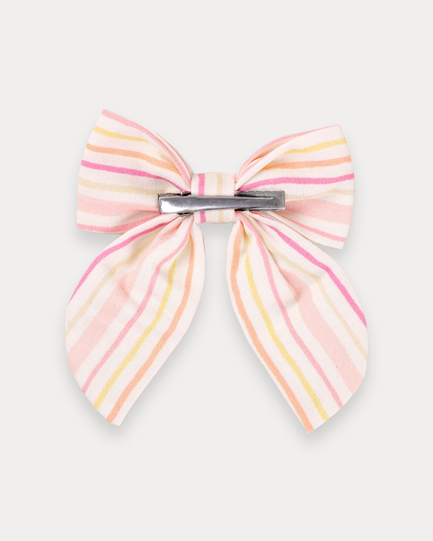 Early Sunday, Audrey Clip in Pink Stripes print, made from Printed 70% Cotton, 30% Linen fabric, featuring a fabric bow design with a secure hair clip fastening, shown in a back flat-lay view