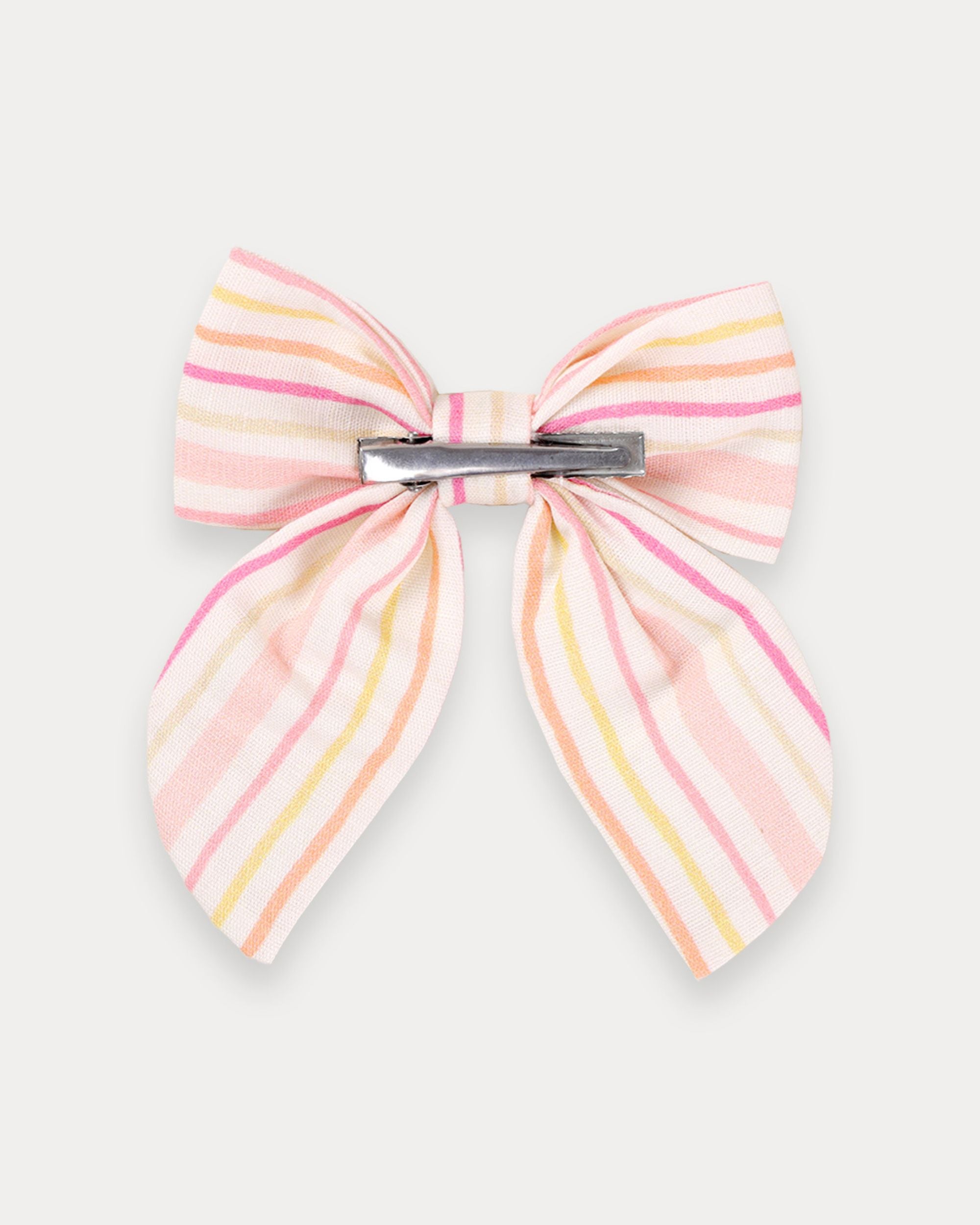 Early Sunday, Audrey Clip in Pink Stripes print, made from Printed 70% Cotton, 30% Linen fabric, featuring a fabric bow design with a secure hair clip fastening, shown in a back flat-lay view