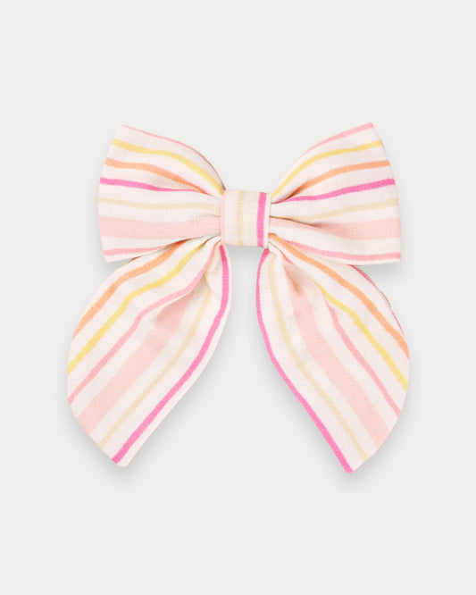Early Sunday, Audrey Clip in Pink Stripes print, made from Printed 70% Cotton, 30% Linen fabric, featuring a fabric bow design with a secure hair clip fastening, shown in a front flat-lay view