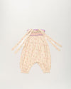 Early Sunday, Audrey Overall Baby Romper in Butterflies print, made from 100% Cotton Swiss Dobby Tiny Dots fabric, featuring tie-up shoulder straps with dot texture & smocked waistband, shown in a back flat-lay view
