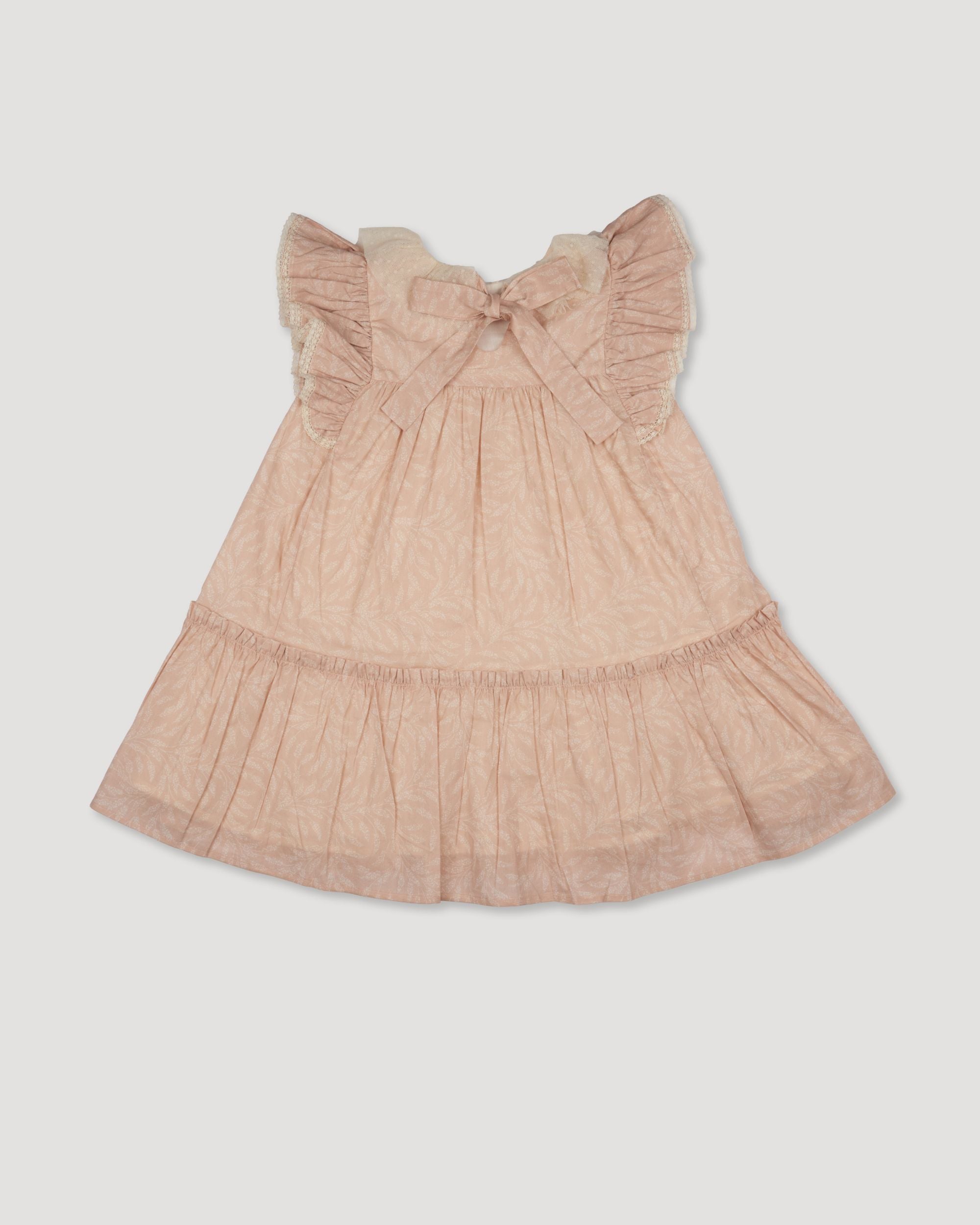 Early Sunday, Aurelia Dress in Feather print, made from Printed Cotton Cambric fabric, featuring Layered ruffles with flutter sleeves, shown in a back flat-lay view