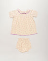 Early Sunday, Baby Bella Dress with Bloomer in Butterflies print, made from 100% Cotton Swiss Dobby Tiny Dots fabric, featuring short puff sleeves with a lilac lace & matching bloomers, shown in a back flat-lay view