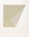 Early Sunday, Baby Napkin in Emma Floral Mint color, made from Printed Cotton Double Gauze fabric, shown in a back flat-lay view