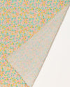 Early Sunday, Baby Napkin in Emma Floral Mint color, made from Printed Cotton Double Gauze fabric, shown in a closeup flat-lay view
