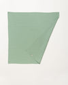 Early Sunday, Baby Napkin in Mint color, made from Printed Cotton Double Gauze fabric, shown in a back flat-lay view
