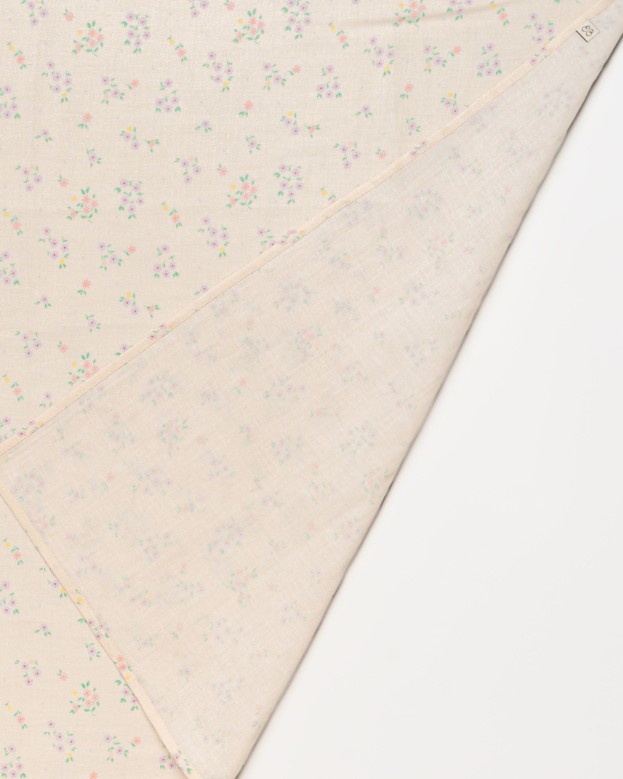 Early Sunday, Baby Napkin in Painted Bouquet print, made from Printed Cotton Double Gauze fabric, shown in a closeup flat-lay view
