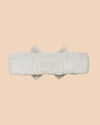 Early Sunday, Baby's Bow Headband in Ivory color, made from All-Over Embroidered Fabric fabric, featuring a wide bow design, shown in a back flat-lay view