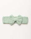 Early Sunday, Baby's Bow Headband in Mint color, made from Cotton Double Gauze fabric, featuring a wide bow design, shown in a front flat-lay view