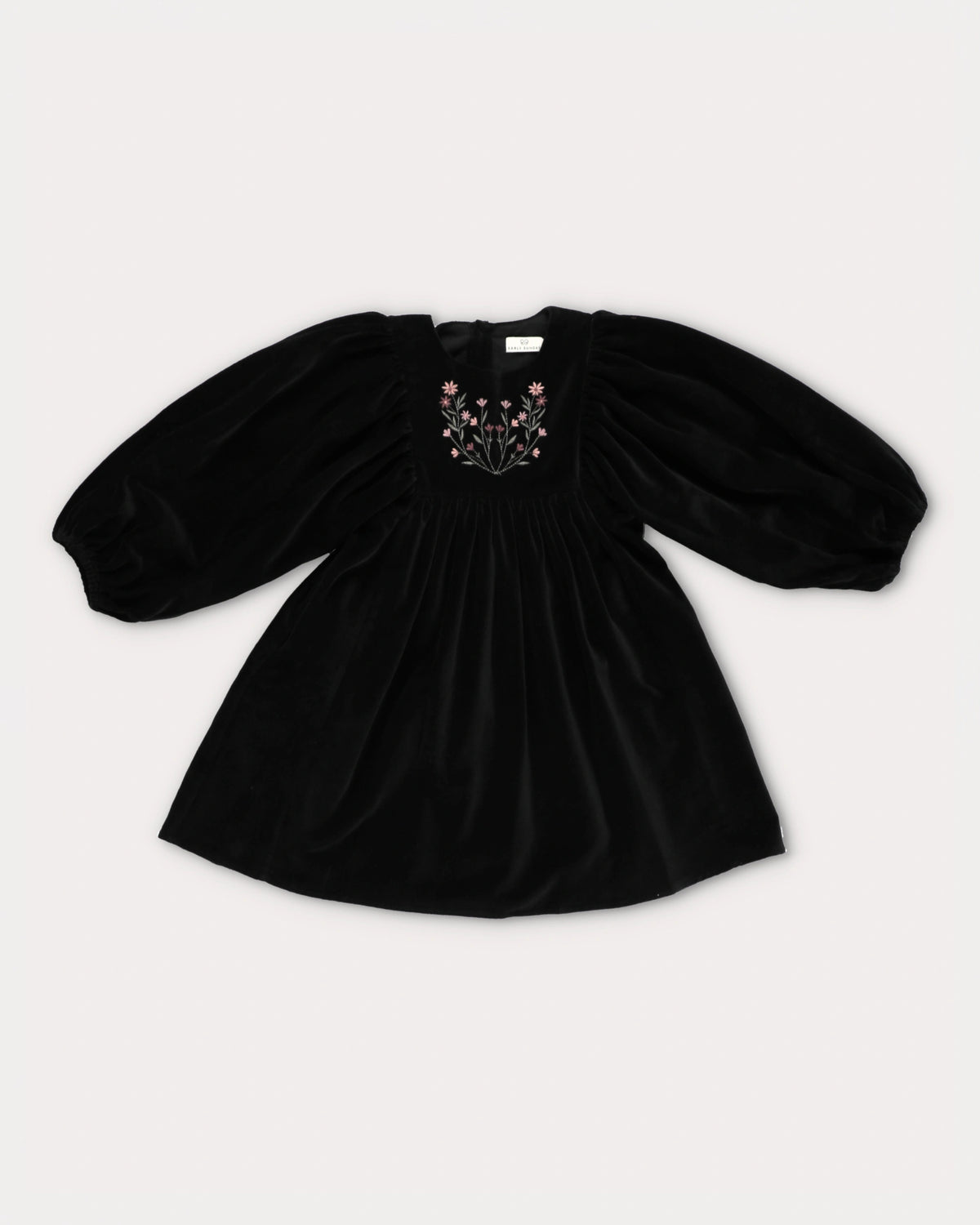 Early Sunday, Belle Dress in Black, made from Cotton Velvet Velour's fabric, featuring a flowing silhouette with puff sleeves and gentle gathers, shown in a front flat-lay view