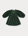 Early Sunday, Belle Dress in Forest Green, made from Cotton Velvet Velour's fabric, featuring a flowing silhouette with puff sleeves and gentle gathers, shown in a front flat-lay view