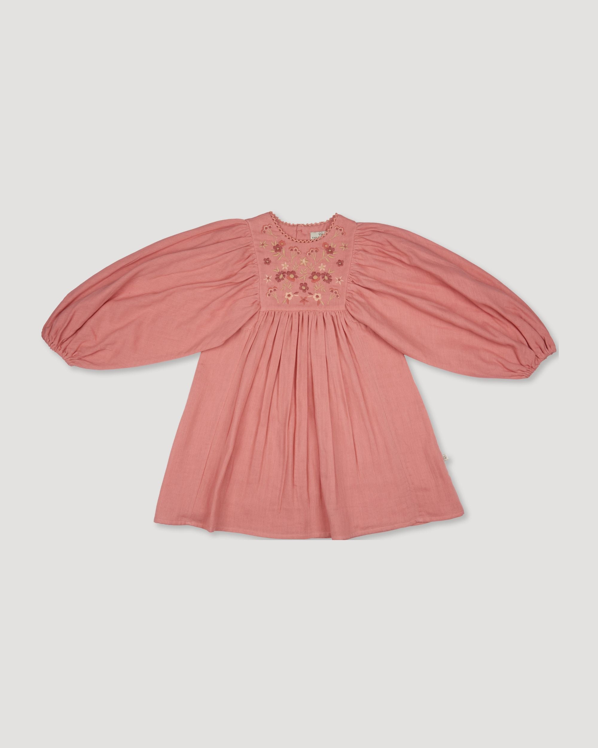 Early Sunday, Belle Dress in Rose, made from Dyed Cotton Double Gauze fabric, featuring Hand-embroidered floral bodice with voluminous puff sleeves for a soft, enchanting silhouette, shown in a front flat-lay view