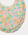 Early Sunday, Bib in Emma Floral Mint color, made from Organic Printed Cotton Double Gauze fabric, shown in a closeup flat-lay view