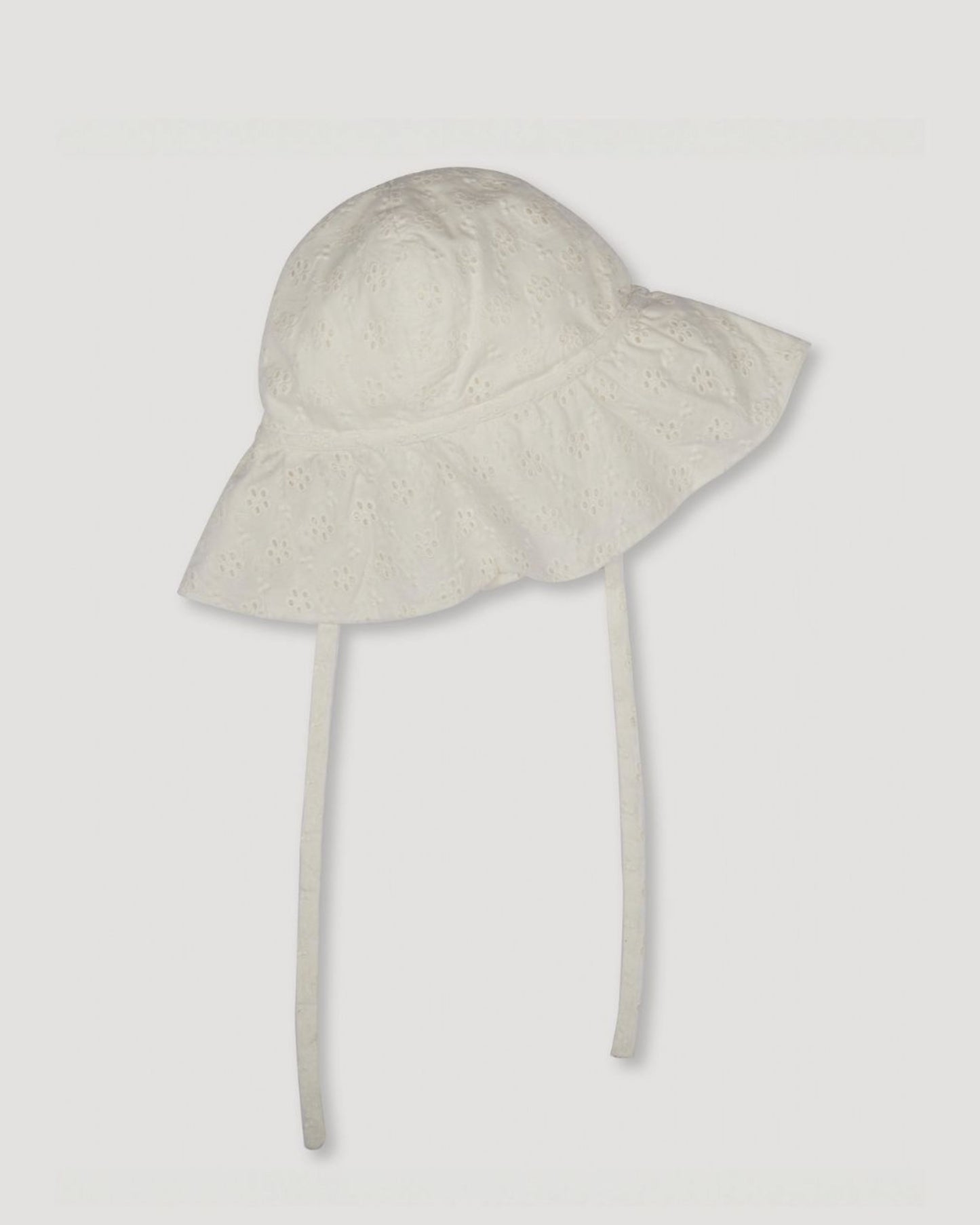 Early Sunday, Bonnie Baby Sun Hat in Ivory color, made from All-Over Eyelet Embroidered Cotton Schifflie fabric, featuring wide brim for sun protection, designed to be lightweight and comfortable for all-day wear, shown in a front flat-lay view