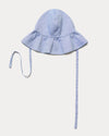 Early Sunday, Bonnie Hat Cap in Summer Sky color, made from Chambray fabric, shown in an angled view with wide brim and tie straps