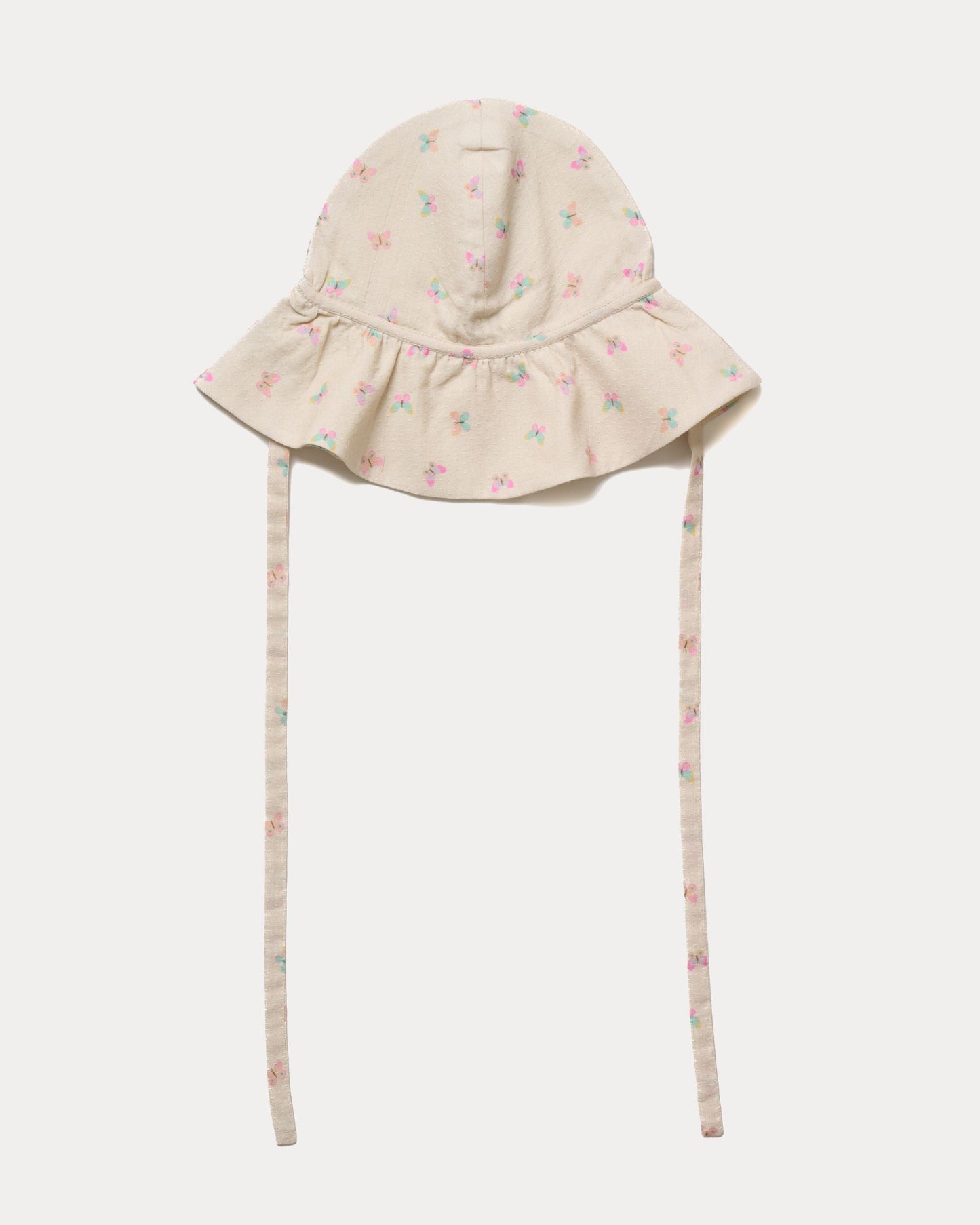 Early Sunday, Bonnie Hat Cap in Butterflies print, made from Printed Tiny Swiss Dobby fabric, shown in a front flat-lay view with wide brim and tie straps