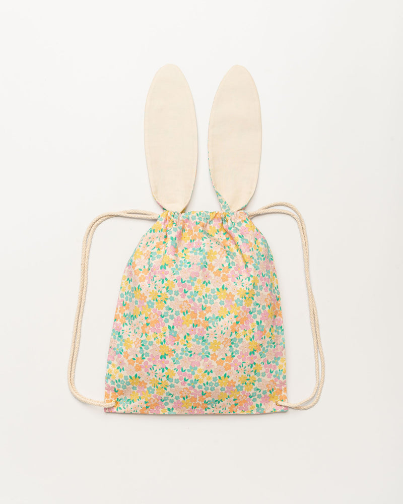 Early Sunday, Bunny Drawstring Backpack in Emma Floral Mint color, made from Organic Printed Cotton Cambric fabric, featuring a bunny-ear design with a drawstring closure, shown in a back flat-lay view