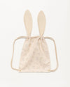 Early Sunday, Bunny Drawstring Backpack in Painted Bouquet print, made from Printed 70% Cotton, 30% Linen fabric, featuring a bunny-ear design with a drawstring closure, shown in a back flat-lay view