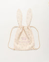 Early Sunday, Bunny Drawstring Backpack in Painted Bouquet print, made from Printed 70% Cotton, 30% Linen fabric, featuring a bunny-ear design with a drawstring closure, shown in a front flat-lay view